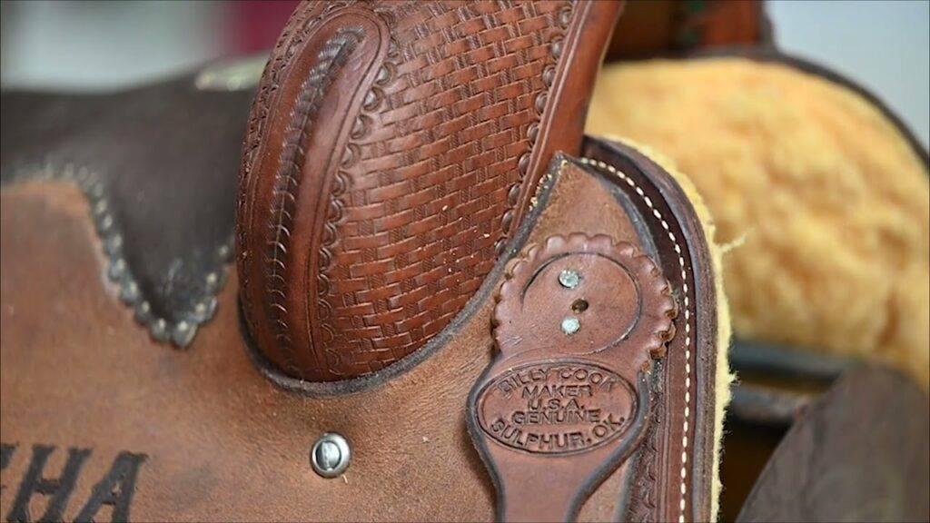 Step-by-step saddle concho installation with screwdriver and leather rosettes